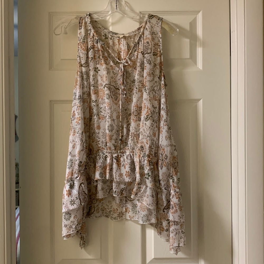 Shear sleeveless flowered top